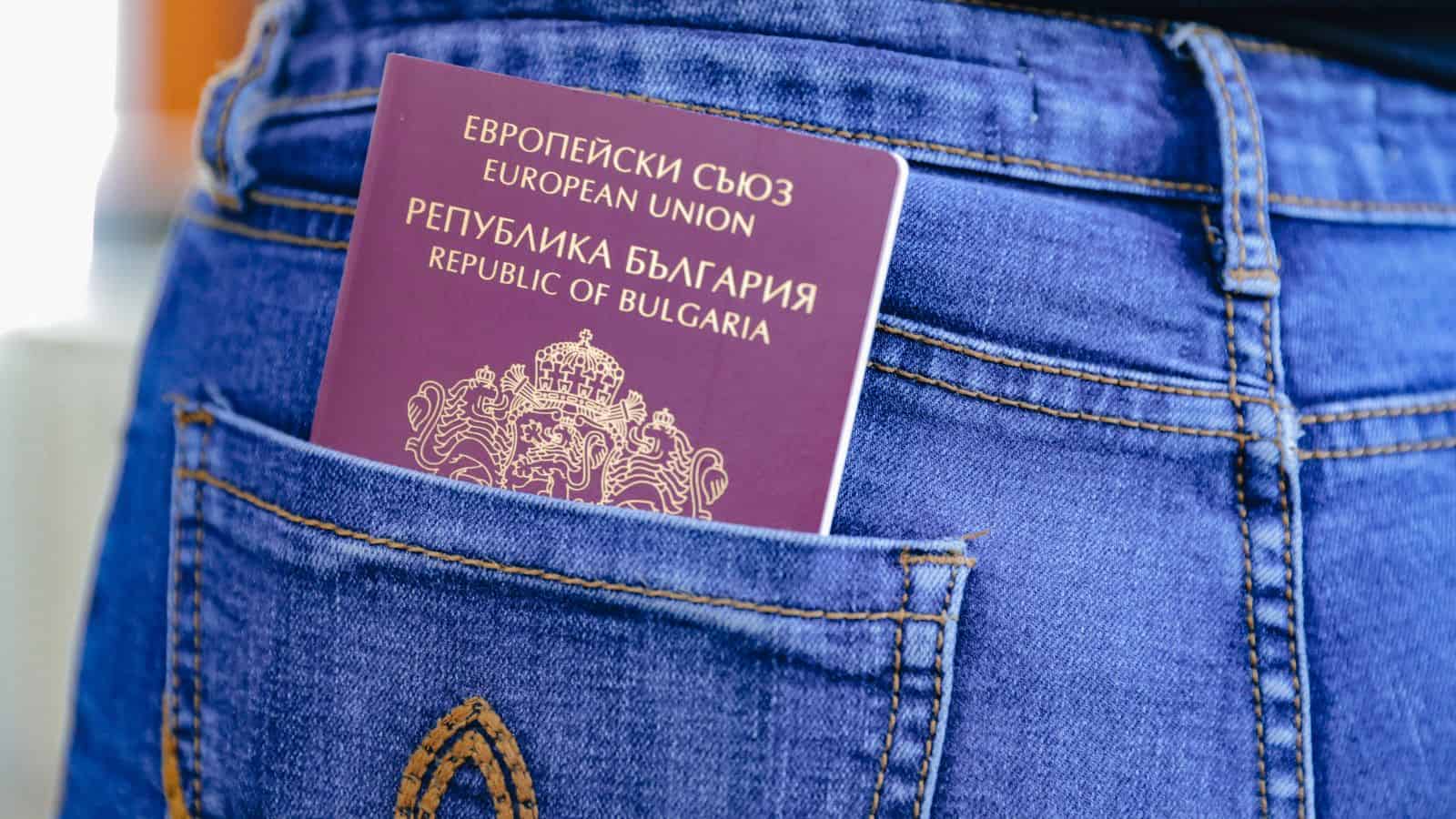 A Bulgarian passport in the back pocket of blue jeans.