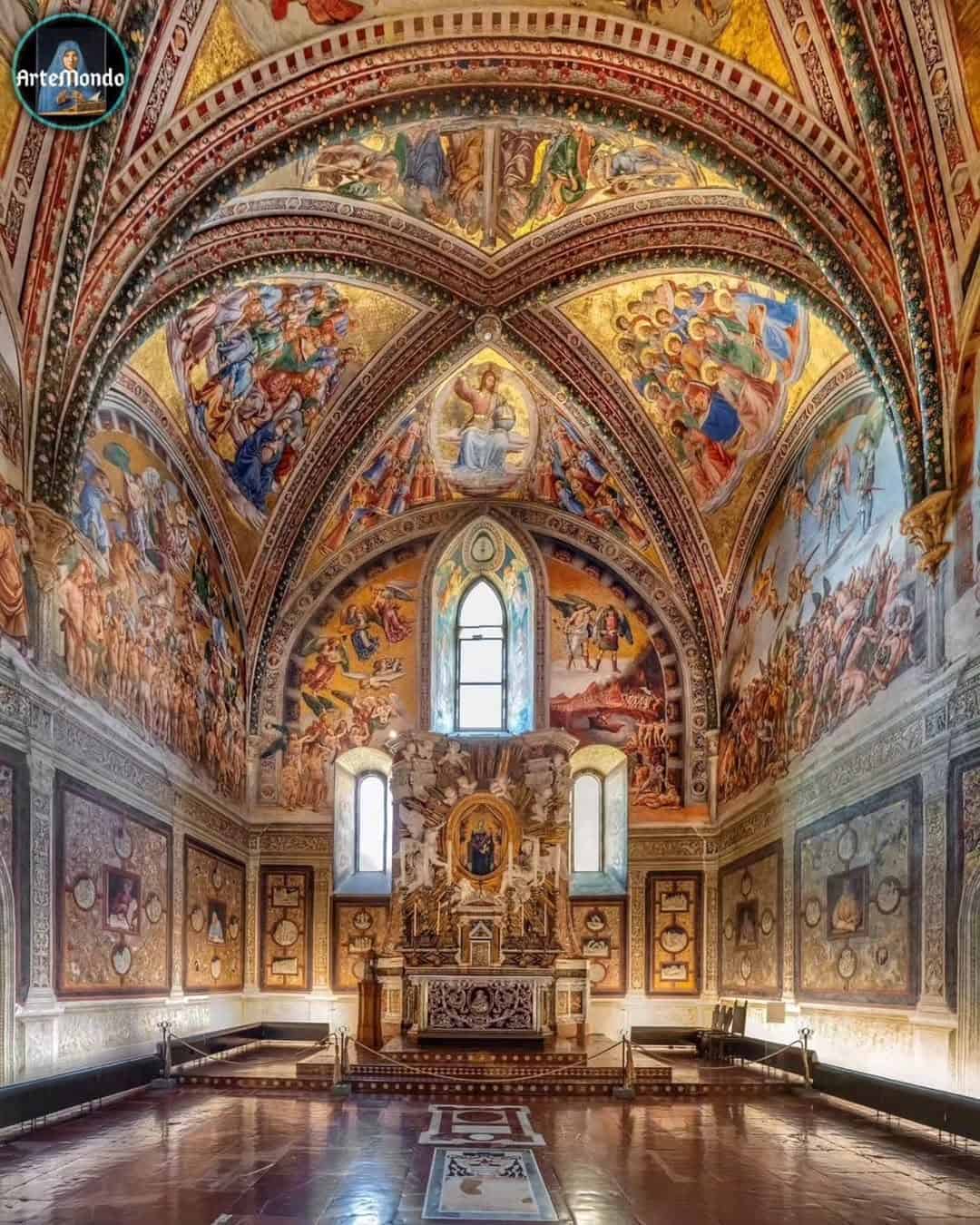 Chapel with vibrant frescoes covering arched ceilings and walls, ornate altar at the center, polished floor&mdash;a hidden gem often included in the best day trips from Rome for families.