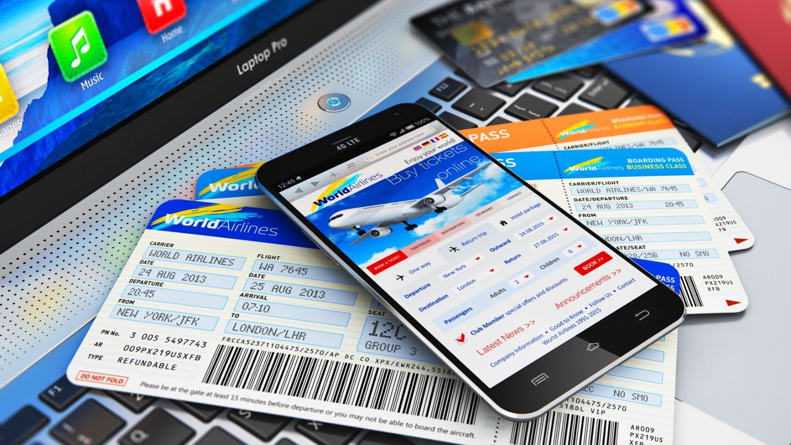 A smartphone displaying an airline booking site rests on travel documents and a laptop keyboard.