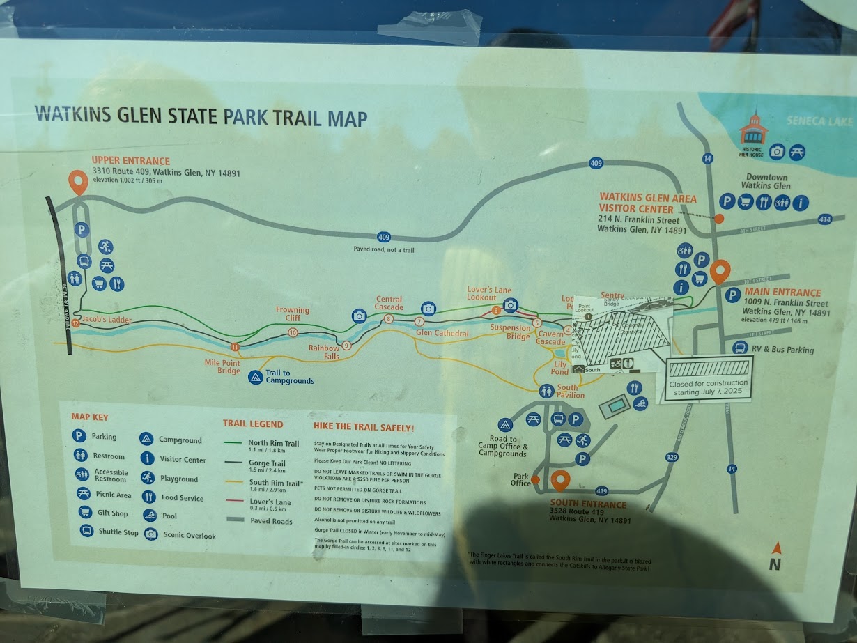 Trail map of Watkins Glen State Park showing entrances, trails, facilities, landmarks, and safety info for exploring Watkins Glen State Park&rsquo;s scenic beauty.